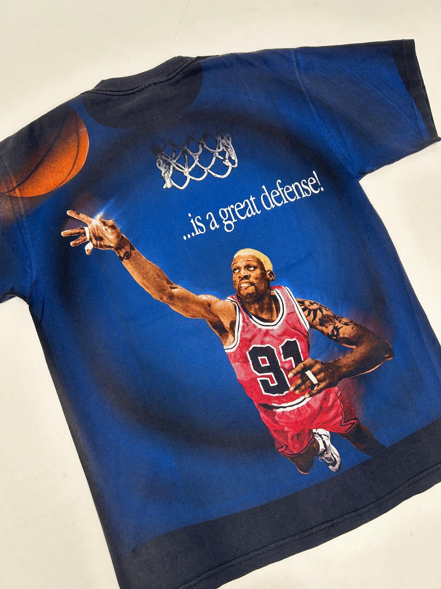 Vintage 1997 Dennis Rodman “The Best Offense Is A Great Defense” All Over Print Tee Tagged Large 22.5x30.5 Inches