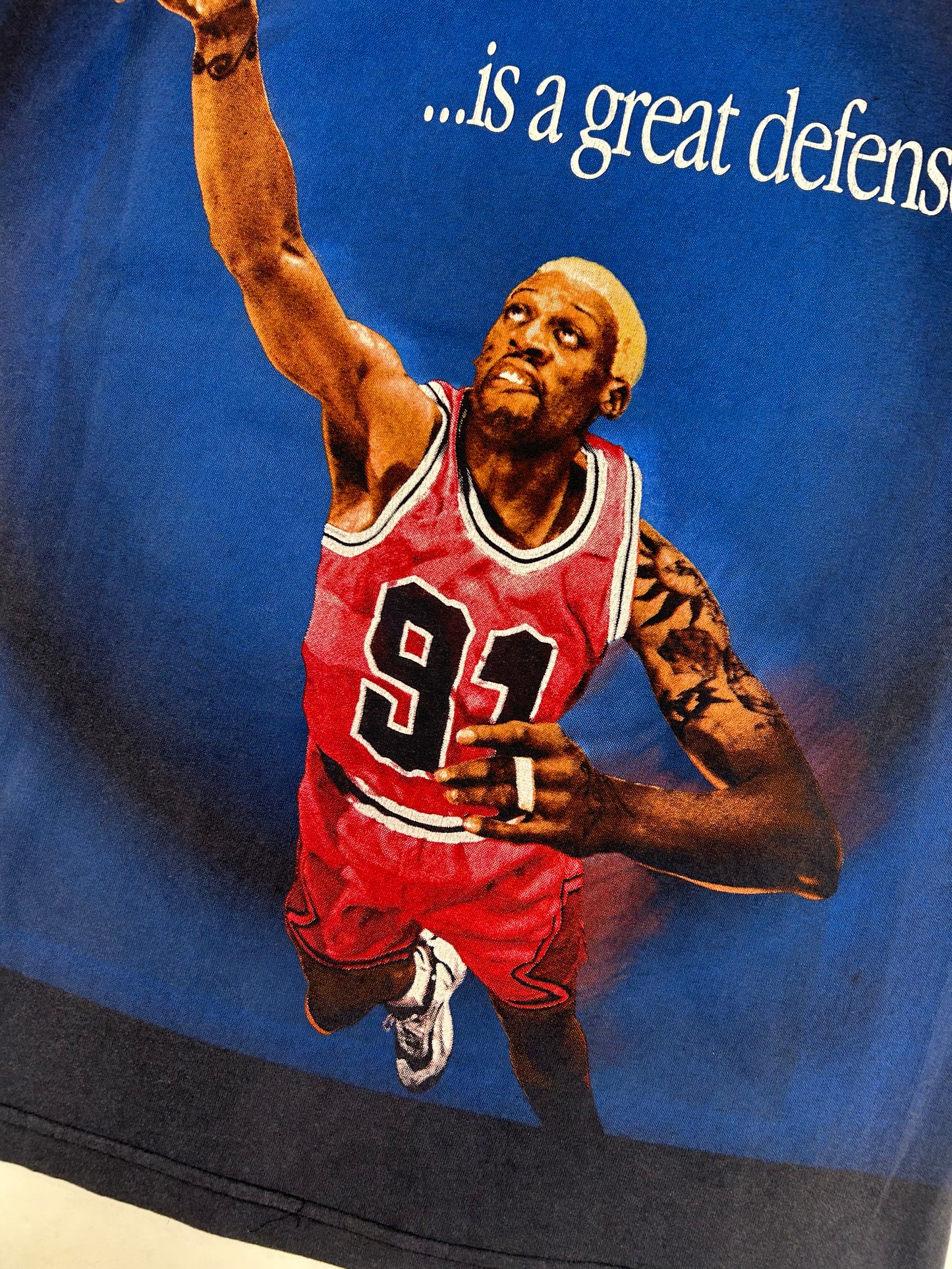 Vintage 1997 Dennis Rodman “The Best Offense Is A Great Defense” All Over Print Tee Tagged Large 22.5x30.5 Inches