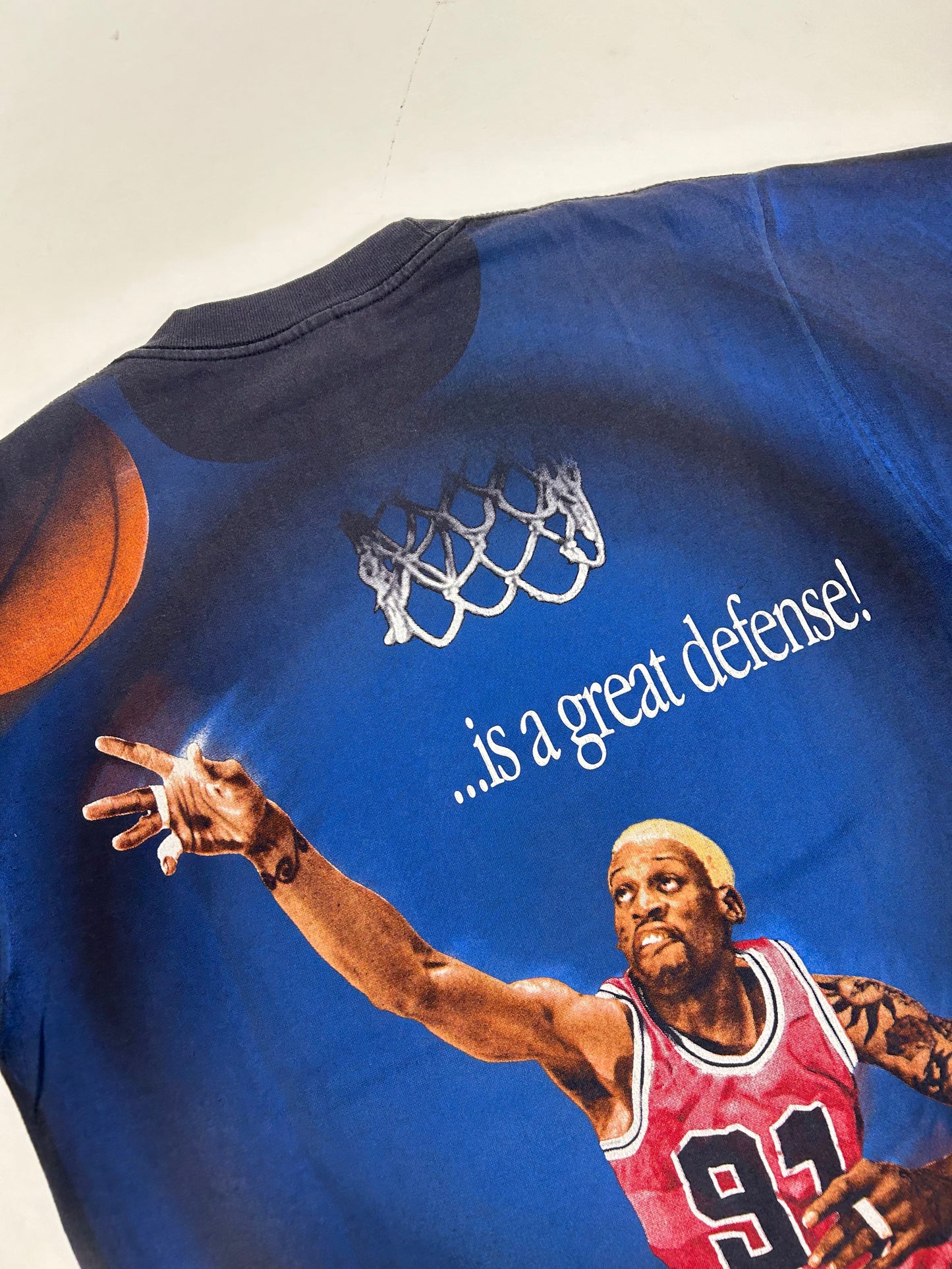 Vintage 1997 Dennis Rodman “The Best Offense Is A Great Defense” All Over Print Tee Tagged Large 22.5x30.5 Inches