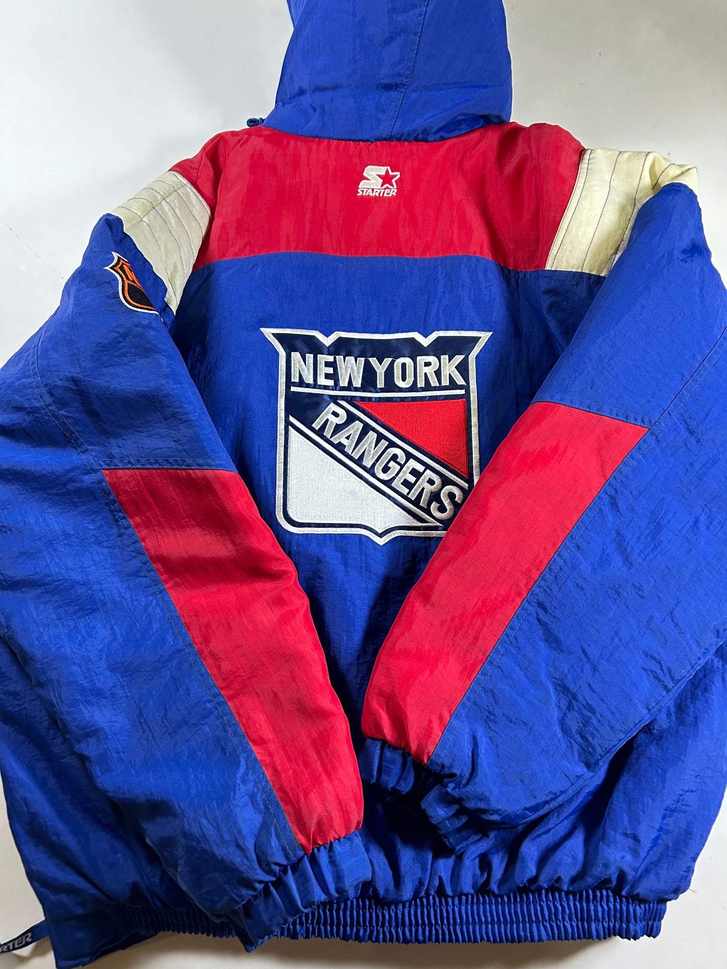 Vintage 90s Starter New York Rangers NHL Pullover Puffer Jacket Half Zip Hooded Jacket XL 29x30.25 Inches