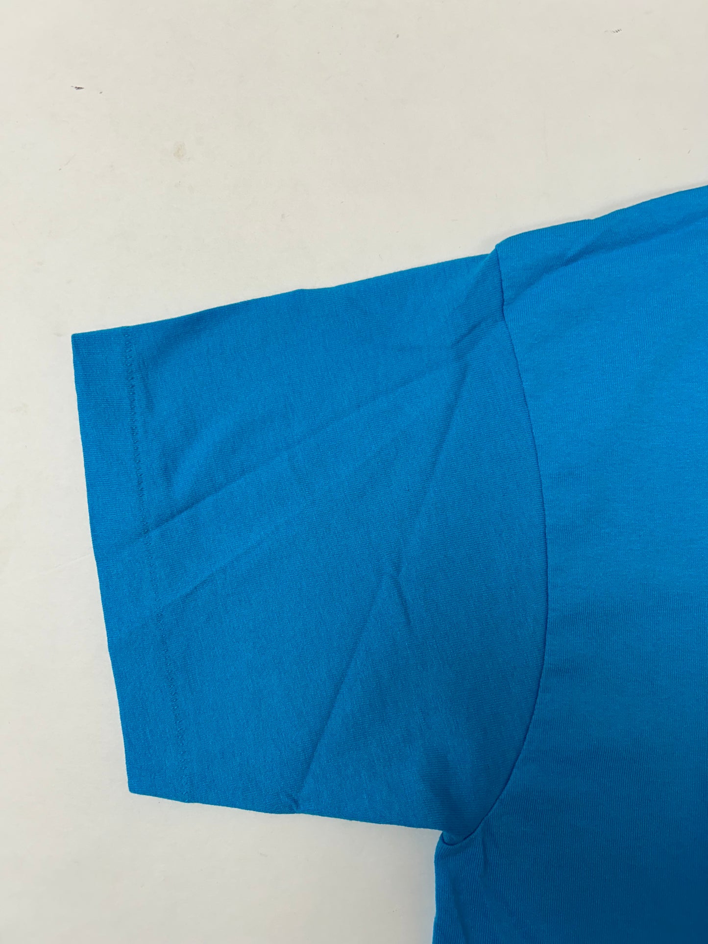 Edgewood NJ first edition “Deeper Than The Roots.” Tee Medium 19.25x28.74 Inches 90s FOTL BEST 50% Cotton 50% Polyester USA Bright Blue