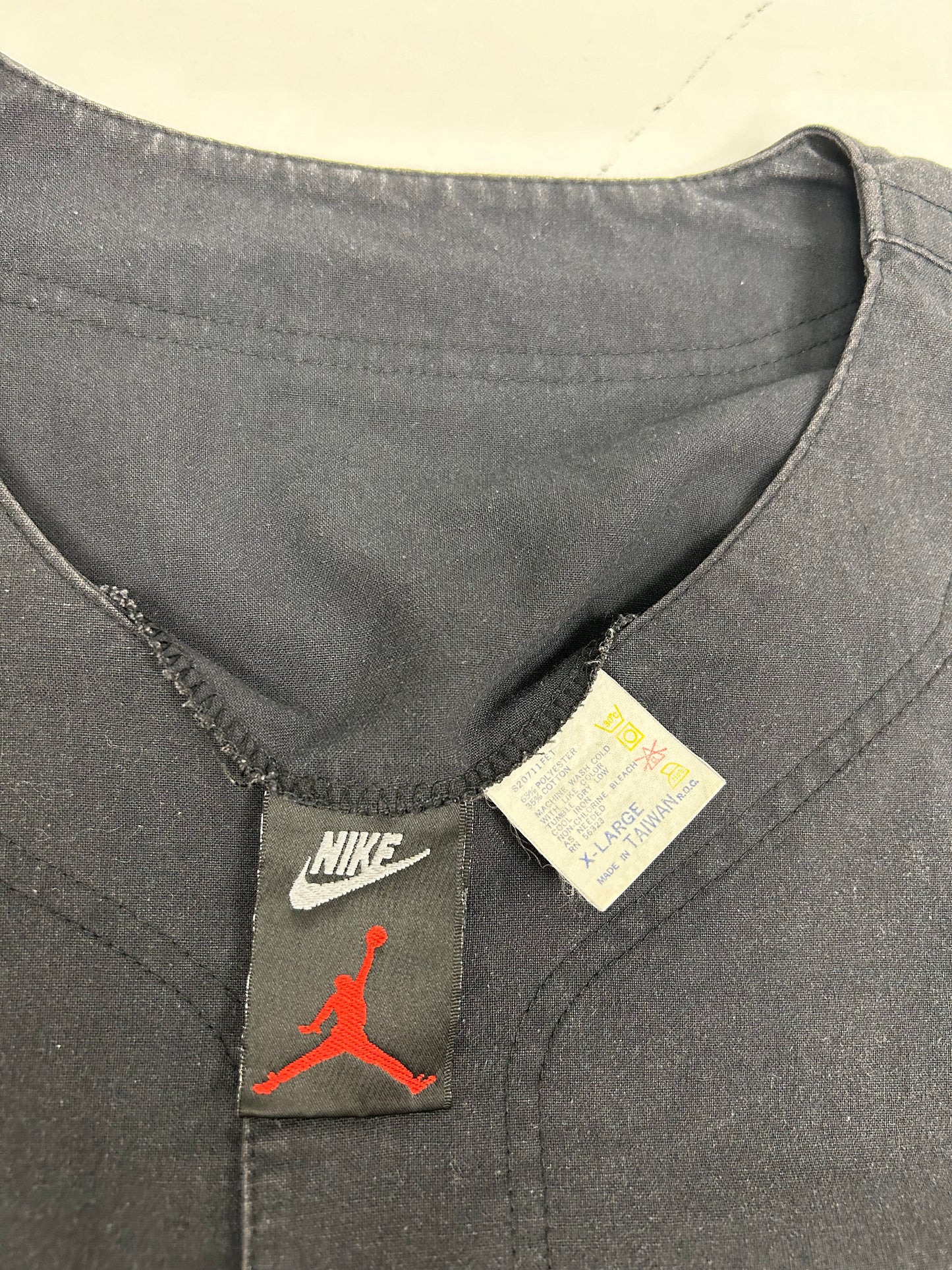 Vintage Nike Air Jordan 'Spellout Logo' Baseball Jersey Black 1991 Rare XL 26.75x32.75/35.25 Inches.