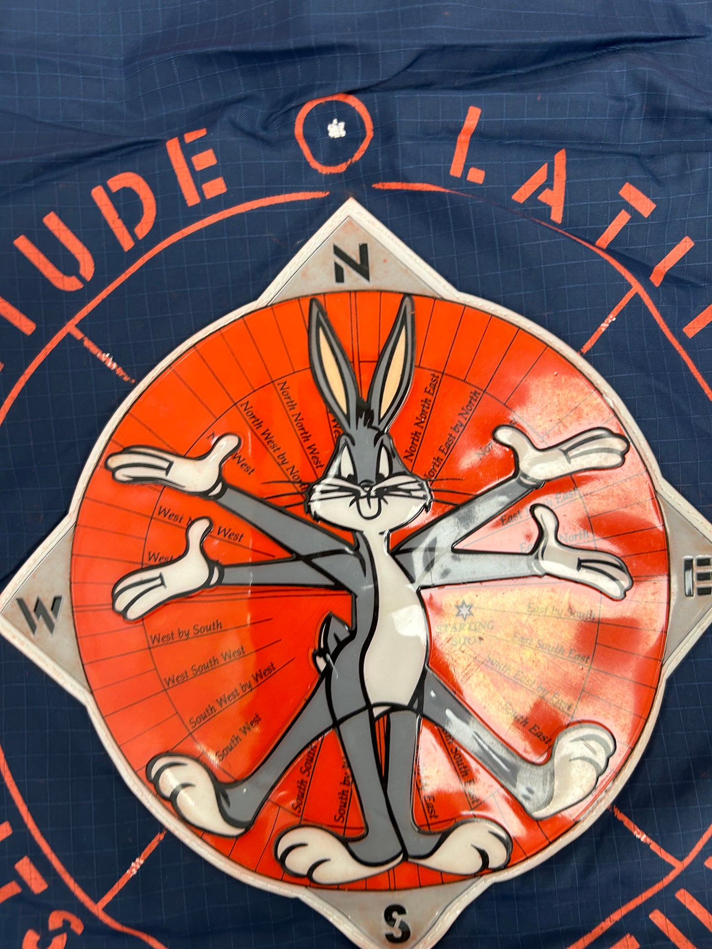 Vintage 1996 Warner Bros. Looney Tunes Bugs Bunny Longitude/Latitude Windbreaker Jacket Large 27.25x29.25 Inches Can Fit XL