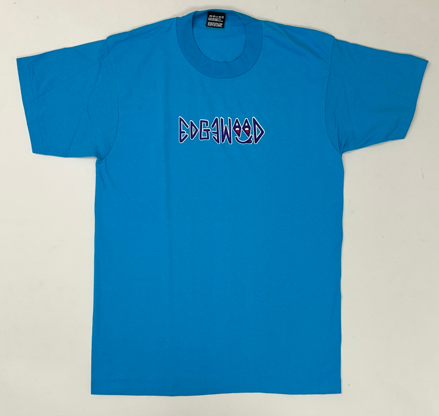 Edgewood NJ first edition “Deeper Than The Roots.” Tee Medium 19.25x28.74 Inches 90s FOTL BEST 50% Cotton 50% Polyester USA Bright Blue