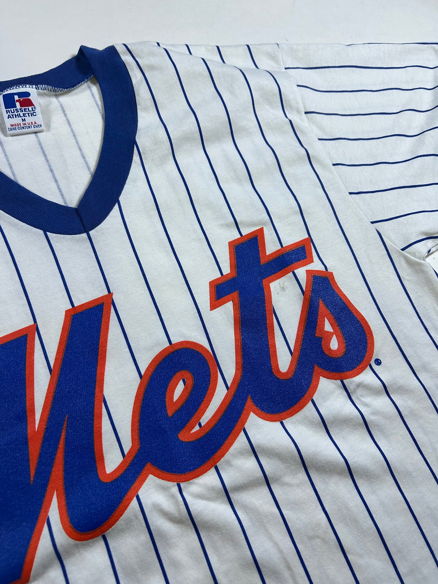 Vintage 90s Russell Athletic New York Mets MLB Pinstripe Baseball Jersey Style Tee Medium 20x29.5 Inches Small Spot