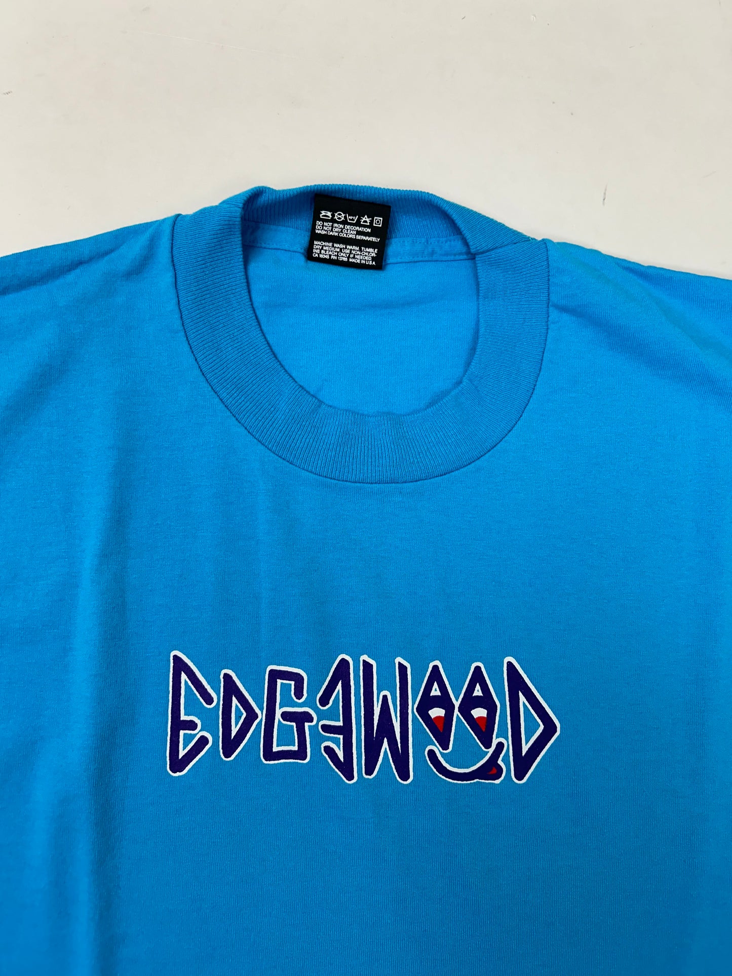 Edgewood NJ first edition “Deeper Than The Roots.” Tee Medium 19.25x28.74 Inches 90s FOTL BEST 50% Cotton 50% Polyester USA Bright Blue