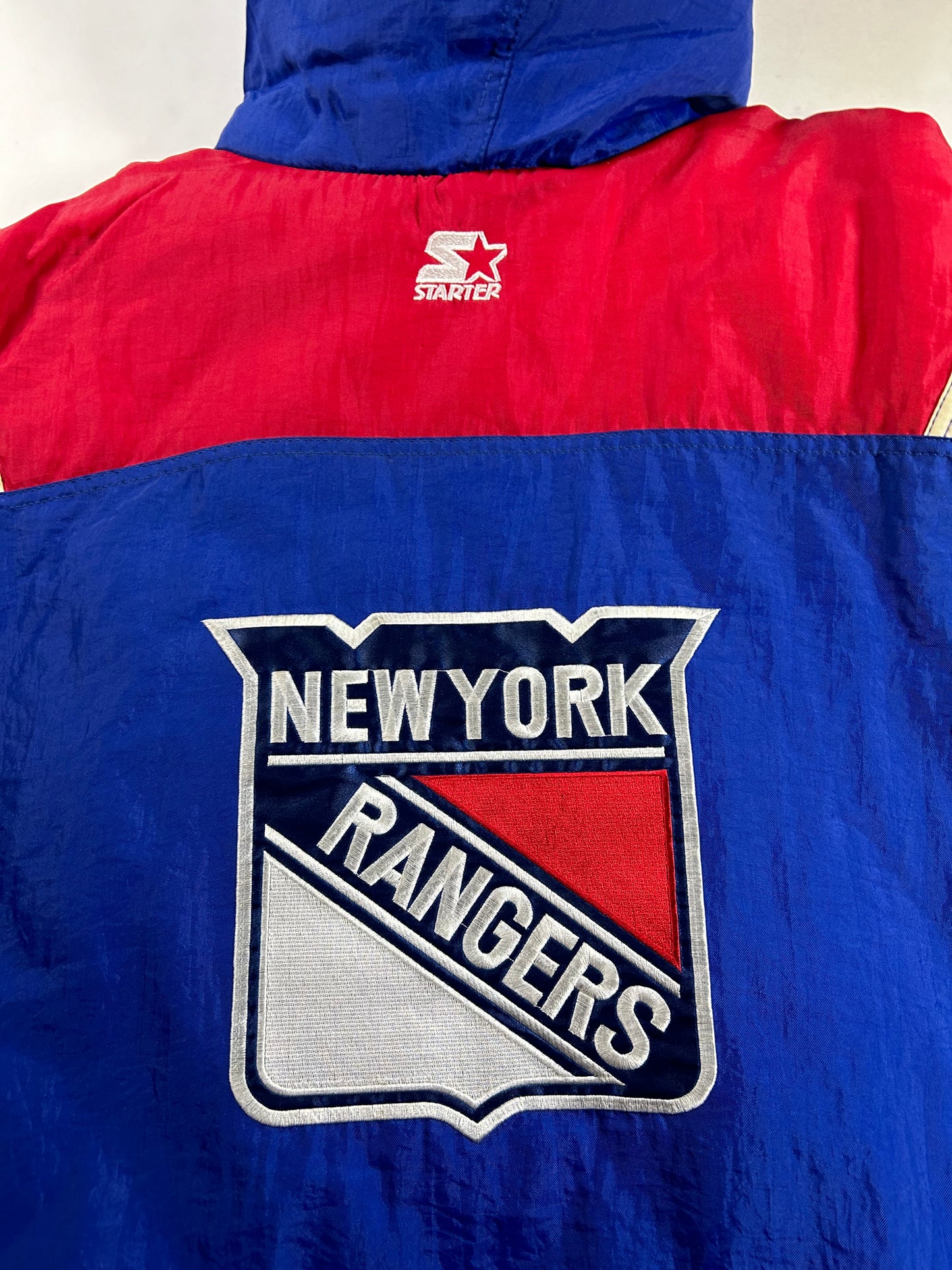 Vintage 90s Starter New York Rangers NHL Pullover Puffer Jacket Half Zip Hooded Jacket XL 29x30.25 Inches