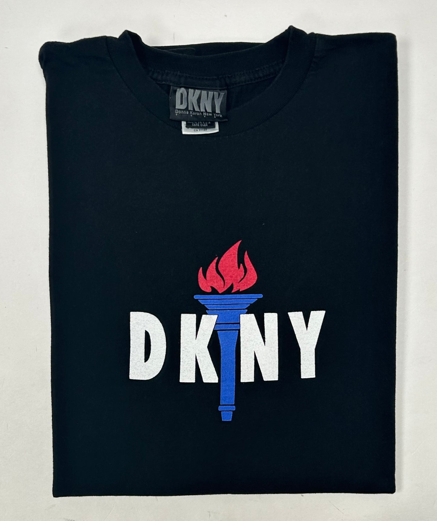 Vintage DKNY Torch Graphic Donna Karan New York USA Tee M/L Fit 21.5x30.25 USA