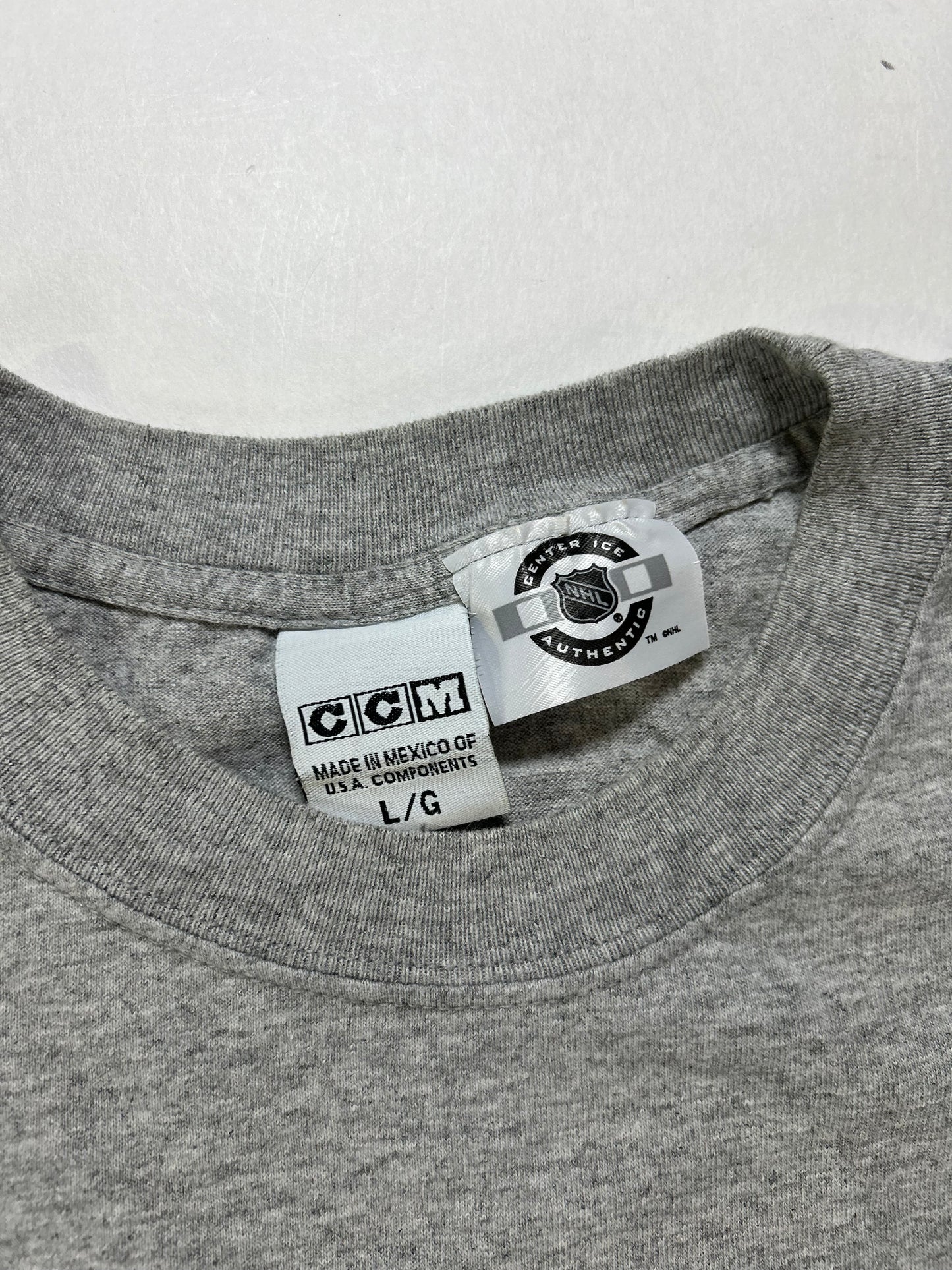 Vintage 2000s CCM Hockey Buffalo Sabres NHL Tee Large 22.75x27.75 Inches Has Flaws On Sleeve As Is