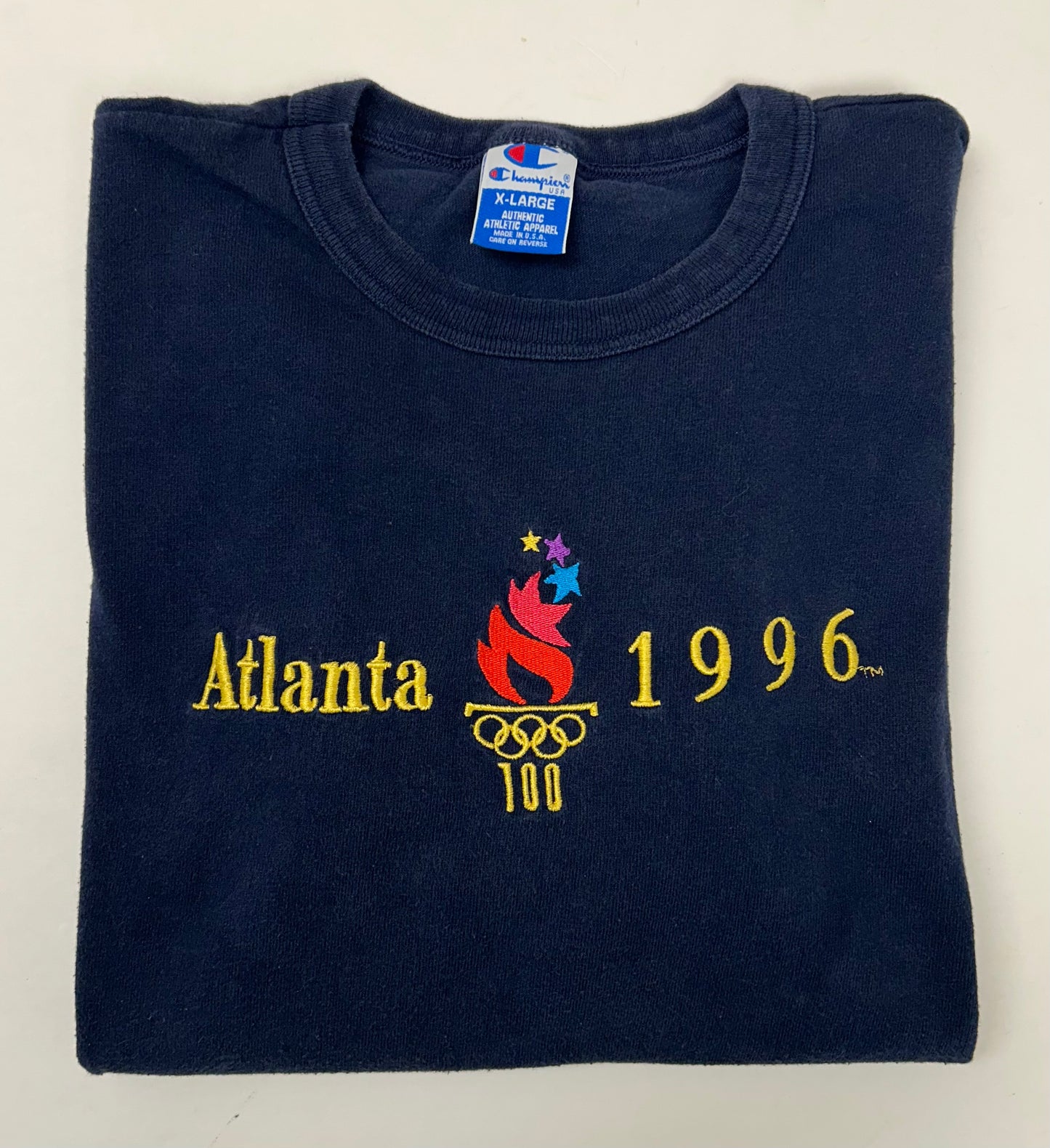 Vintage Champion 1996 Atalanta Olympics Embroidered Logo Tee Navy XL 24.25x28.5 Inches