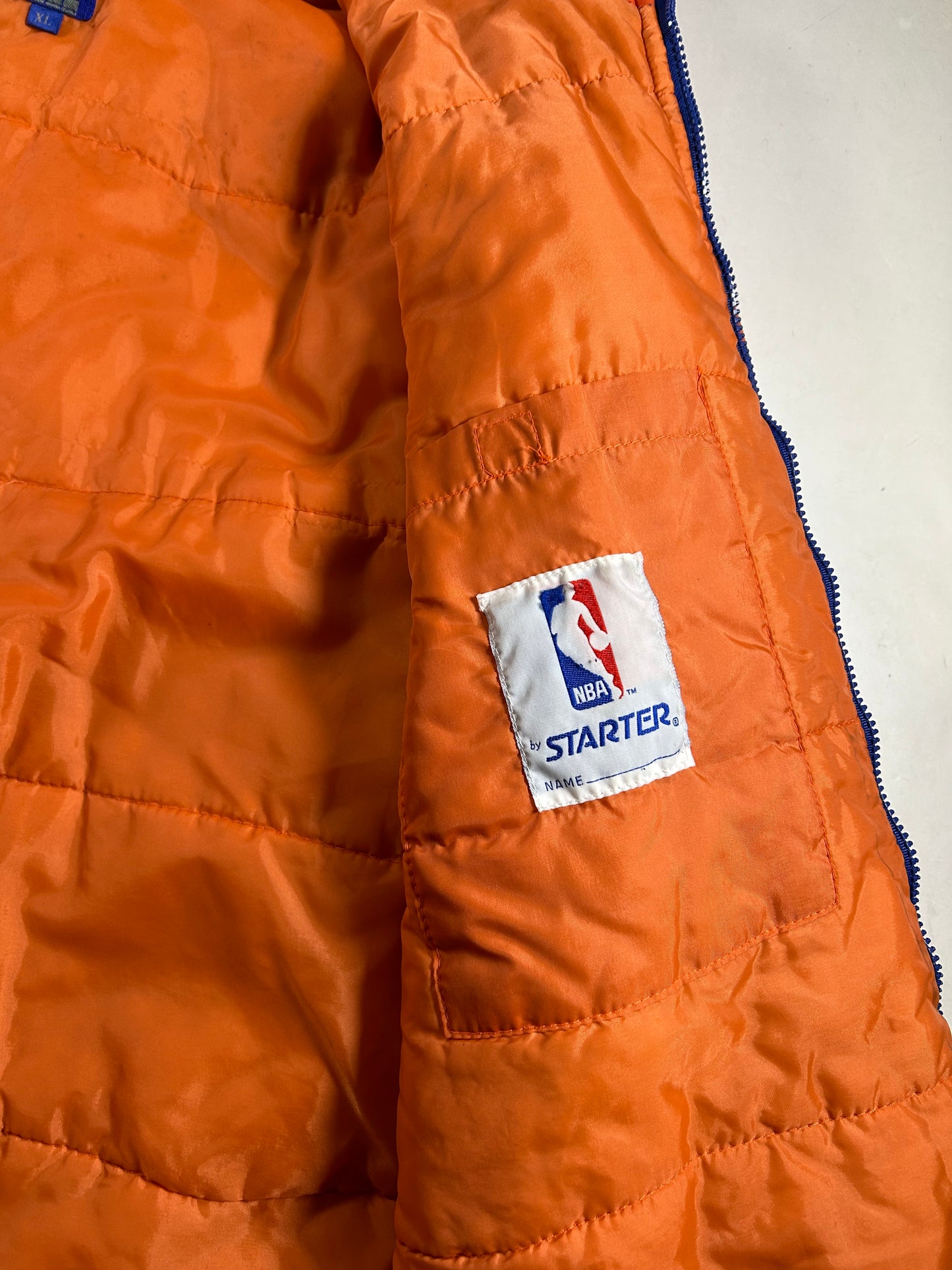 Vintage Starter New York Knicks Puffer Zip Up Packable Hood Jacket NYK XL 29x29.25 Inches As Is Has Stains 90s