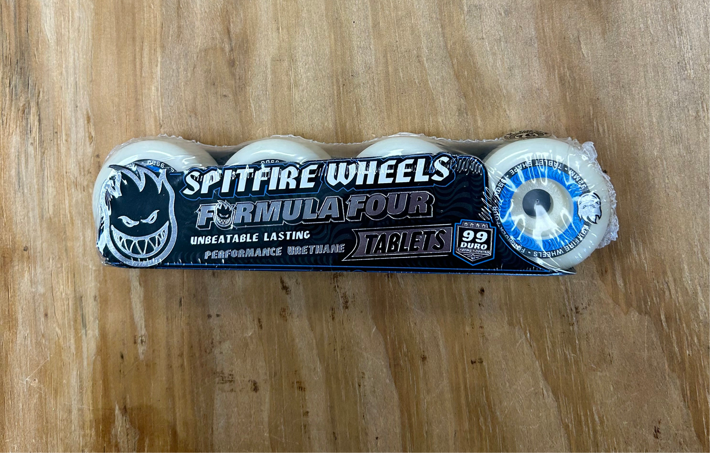 Spitfire Formula 4 Tablets 99 Duro 54 MM White/Blue Wheel