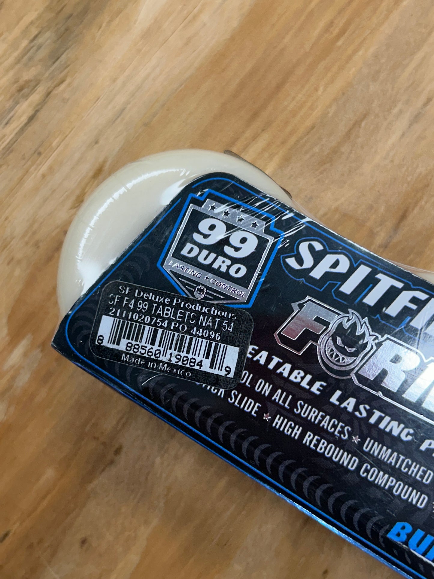 Spitfire Formula 4 Tablets 99 Duro 54 MM White/Blue Wheel