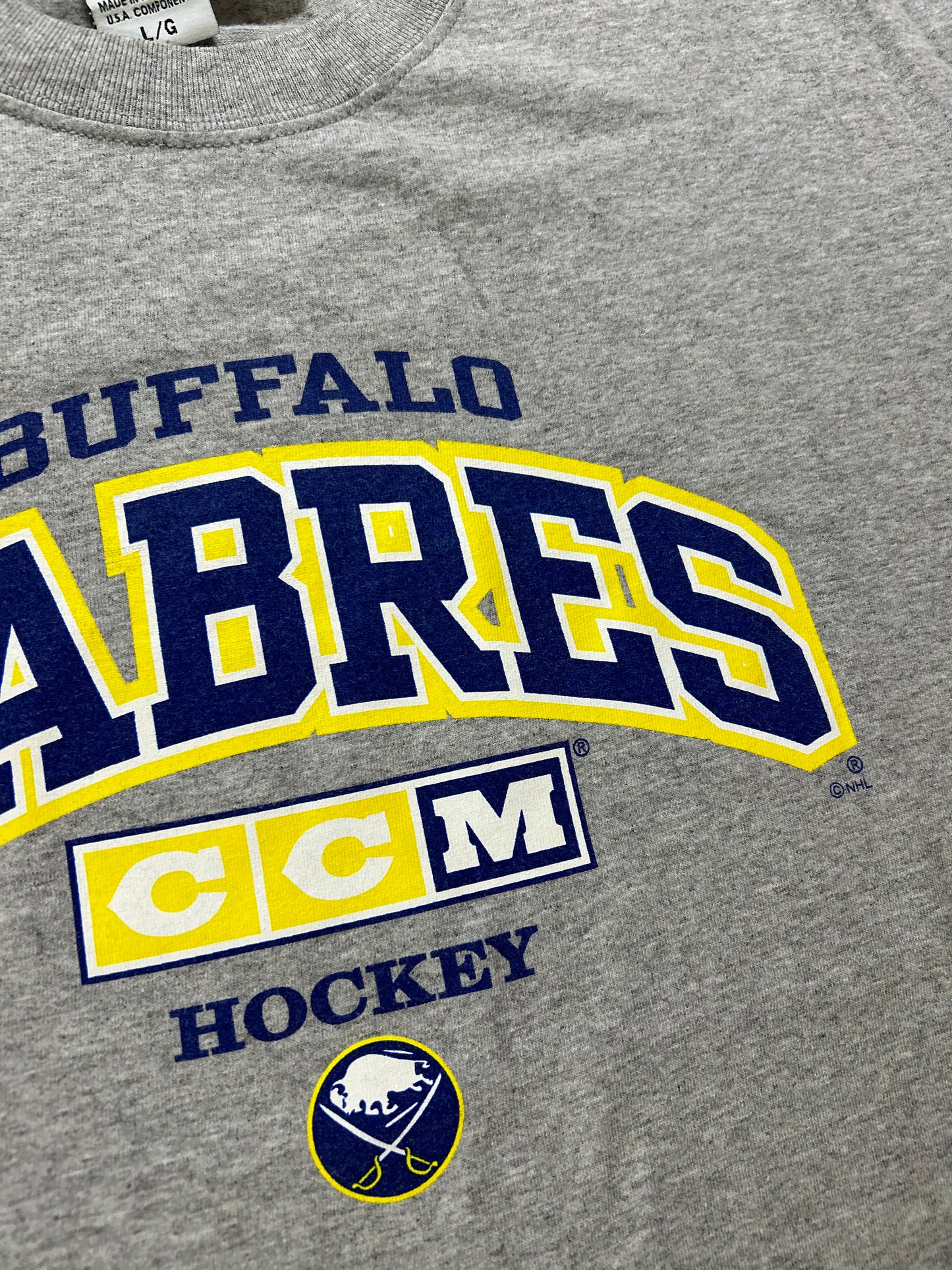 Vintage 2000s CCM Hockey Buffalo Sabres NHL Tee Large 22.75x27.75 Inches Has Flaws On Sleeve As Is