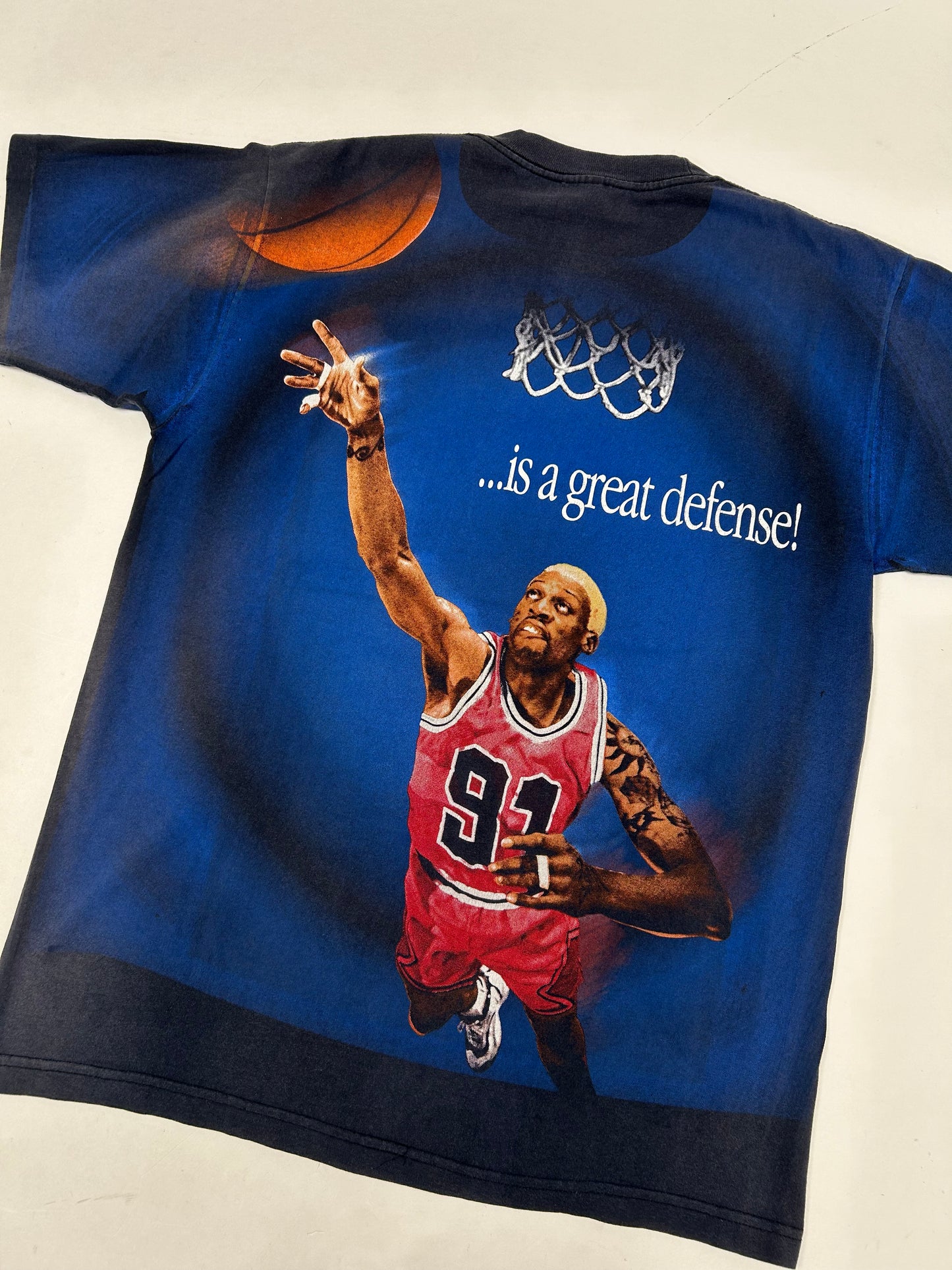 Vintage 1997 Dennis Rodman “The Best Offense Is A Great Defense” All Over Print Tee Tagged Large 22.5x30.5 Inches