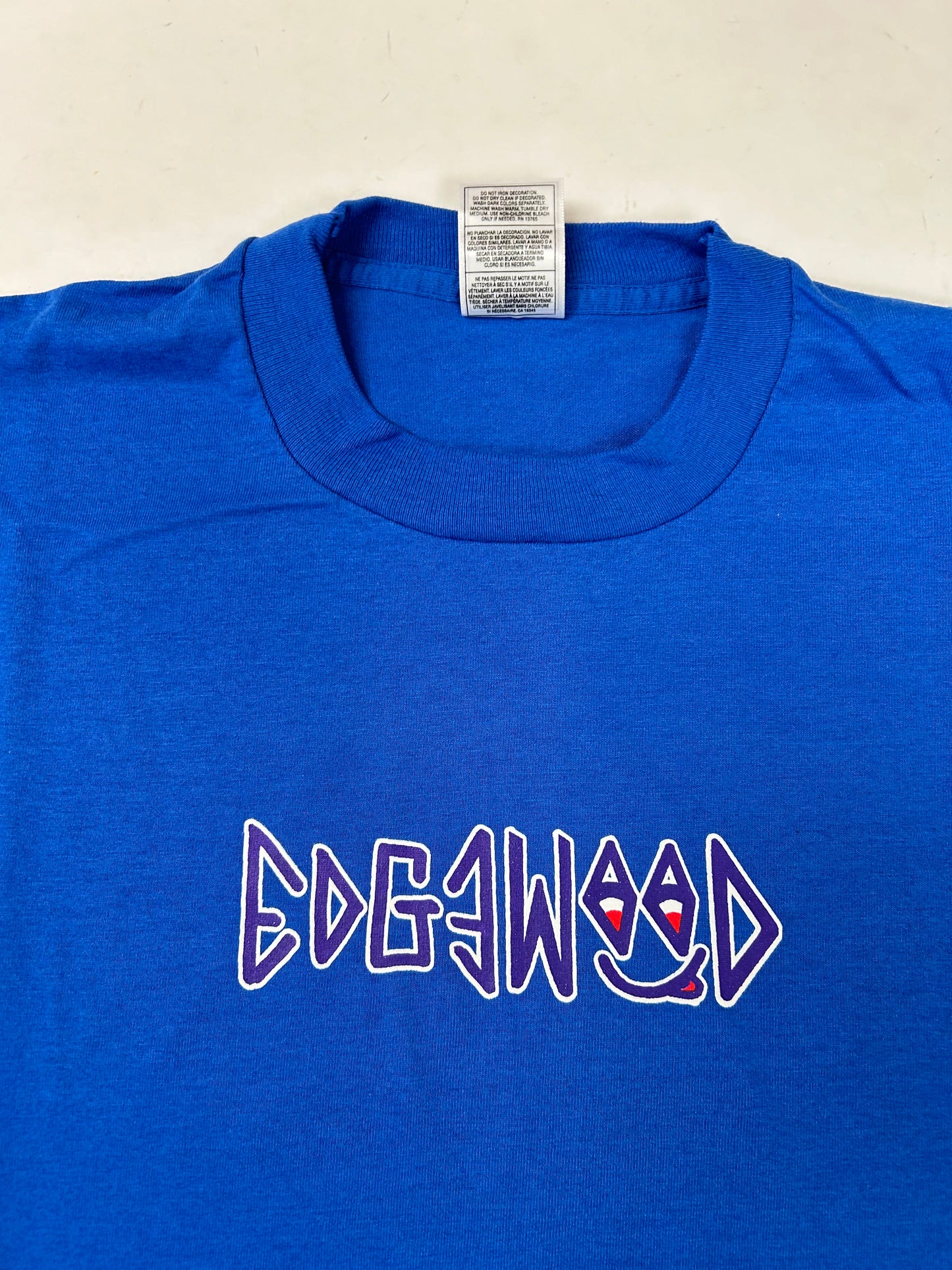Edgewood NJ first edition “Deeper Than The Roots.” Tee 90s Fruit Of The Loom USA 50/50 Blend Royal Blue